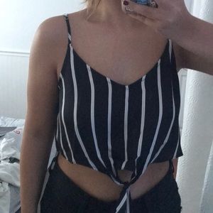 a black shirt with yellow and white stripes